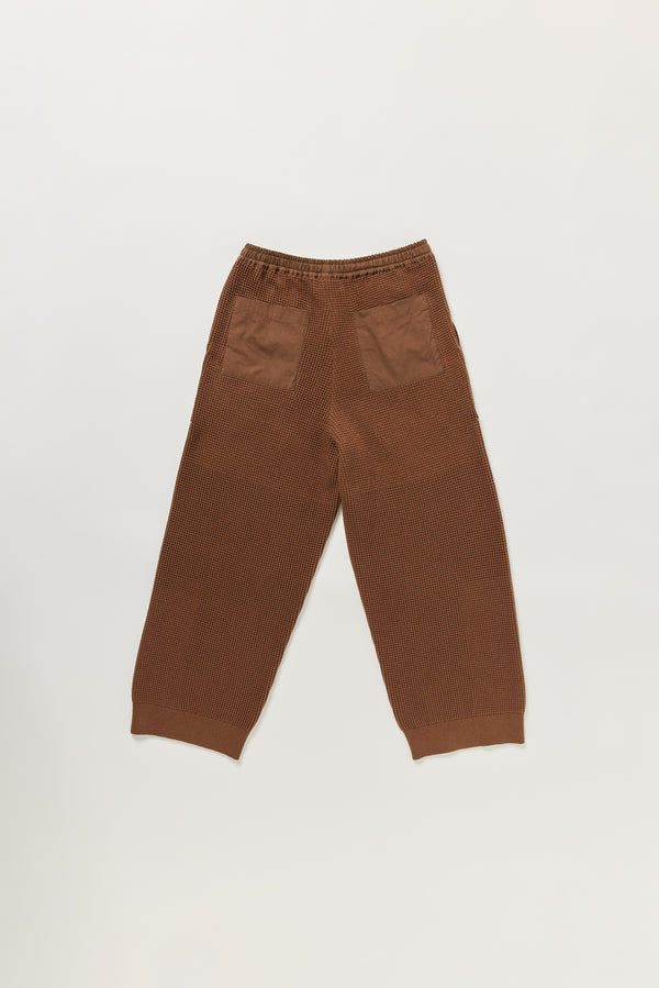 Flat lay of KLOKE knit pant in brown, back view