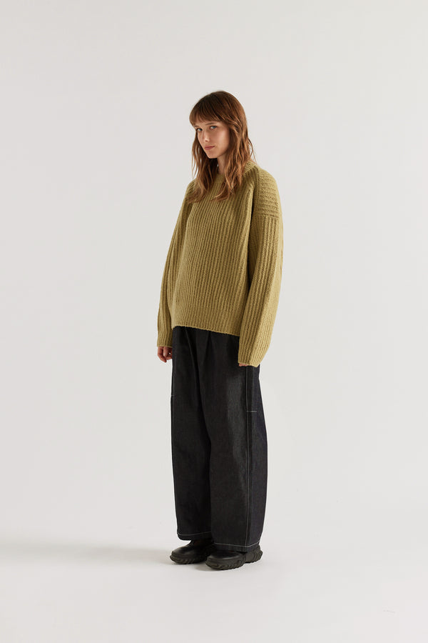 chartreuse Flutter Sweater front view showing chunky reverse half-cardigan rib knit construction, dropped shoulders and relaxed raglan sleeve silhouette