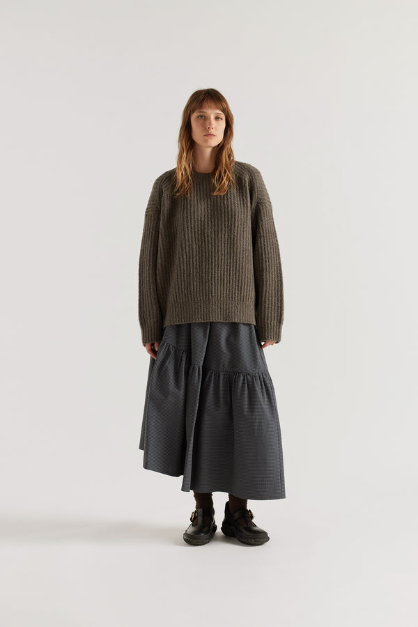 Pale Pewter Flutter Sweater front view showing chunky reverse half-cardigan rib knit construction, dropped shoulders and relaxed raglan sleeve silhouette
