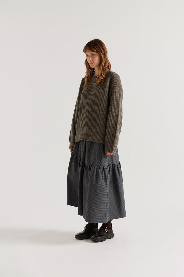 Pale Pewter Flutter Sweater front view showing chunky reverse half-cardigan rib knit construction, dropped shoulders and relaxed raglan sleeve silhouette