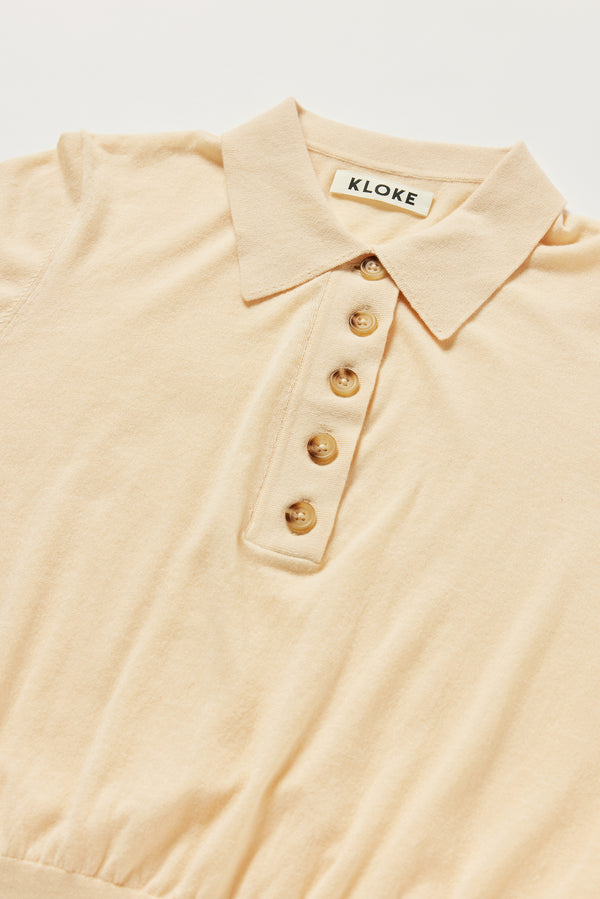 Close-up of KLOKE short sleeve knit polo neckline and fine knit texture