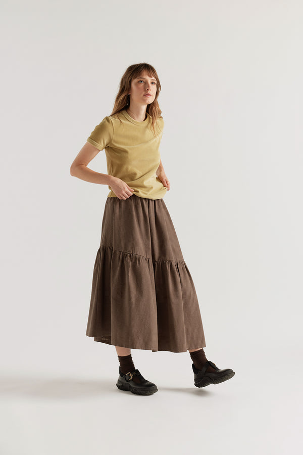 Front of the model in Saffron Tee in yellow, slim-fit vintage-inspired ringer tee in Japanese stretch corduroy