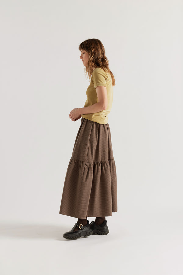 Side of the model in Saffron Tee in yellow, slim-fit vintage-inspired ringer tee in Japanese stretch corduroy