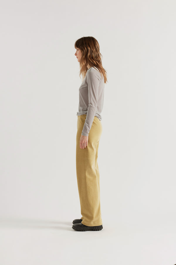 Side view of Sedate Lounge Pant in Yellow, relaxed-fit lounge pant in Japanese stretch corduroy velour