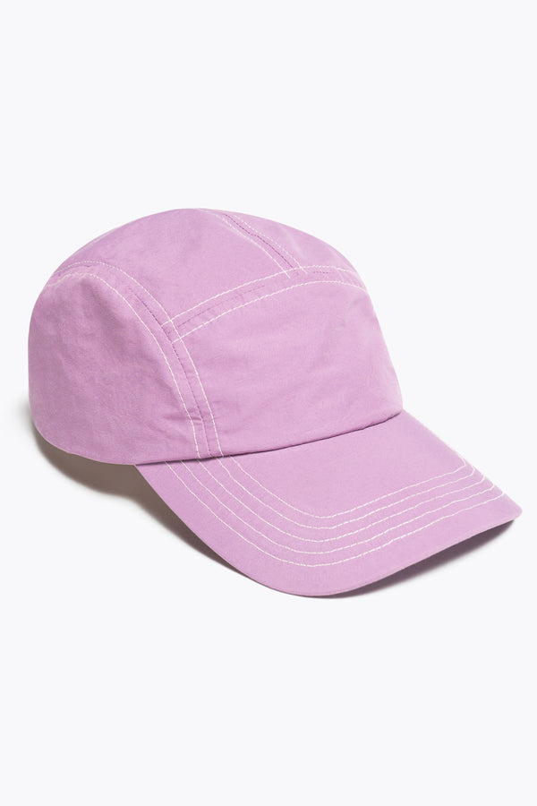 Unisex purple 5-panel zip cap in quick-dry technical nylon with a hidden zip pocket, adjustable back strap, and subtle embroidered Kloke branding